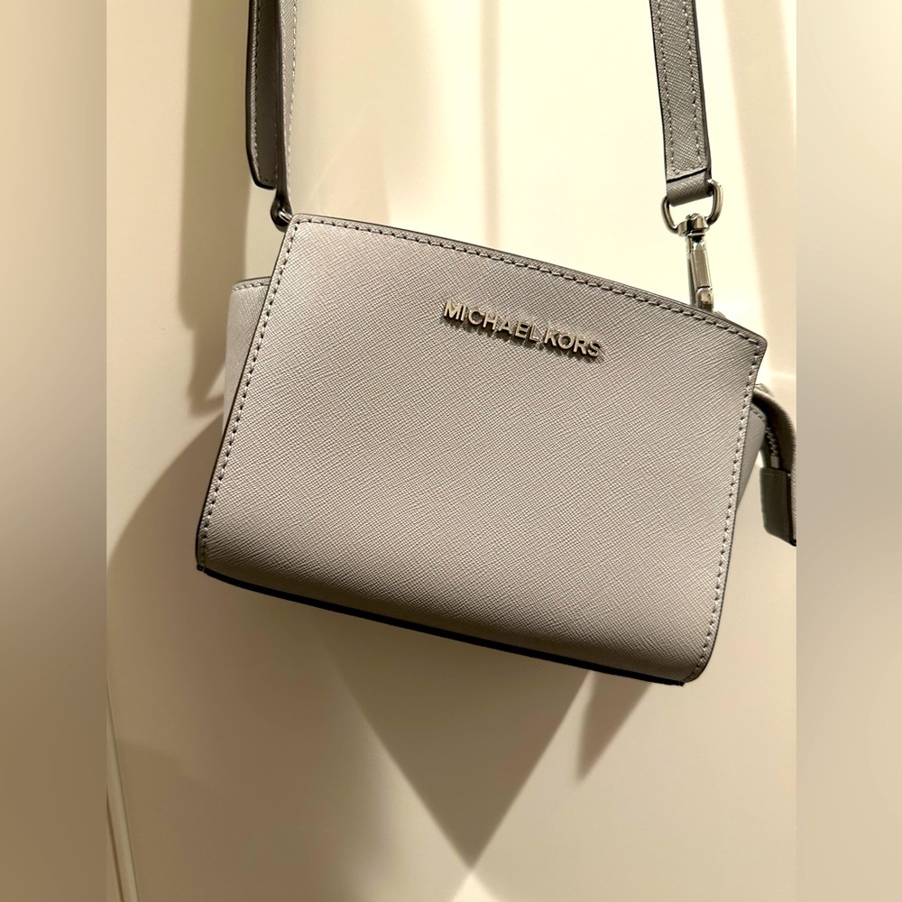 Micheal Kors light grey crossbody bag; only used once.
